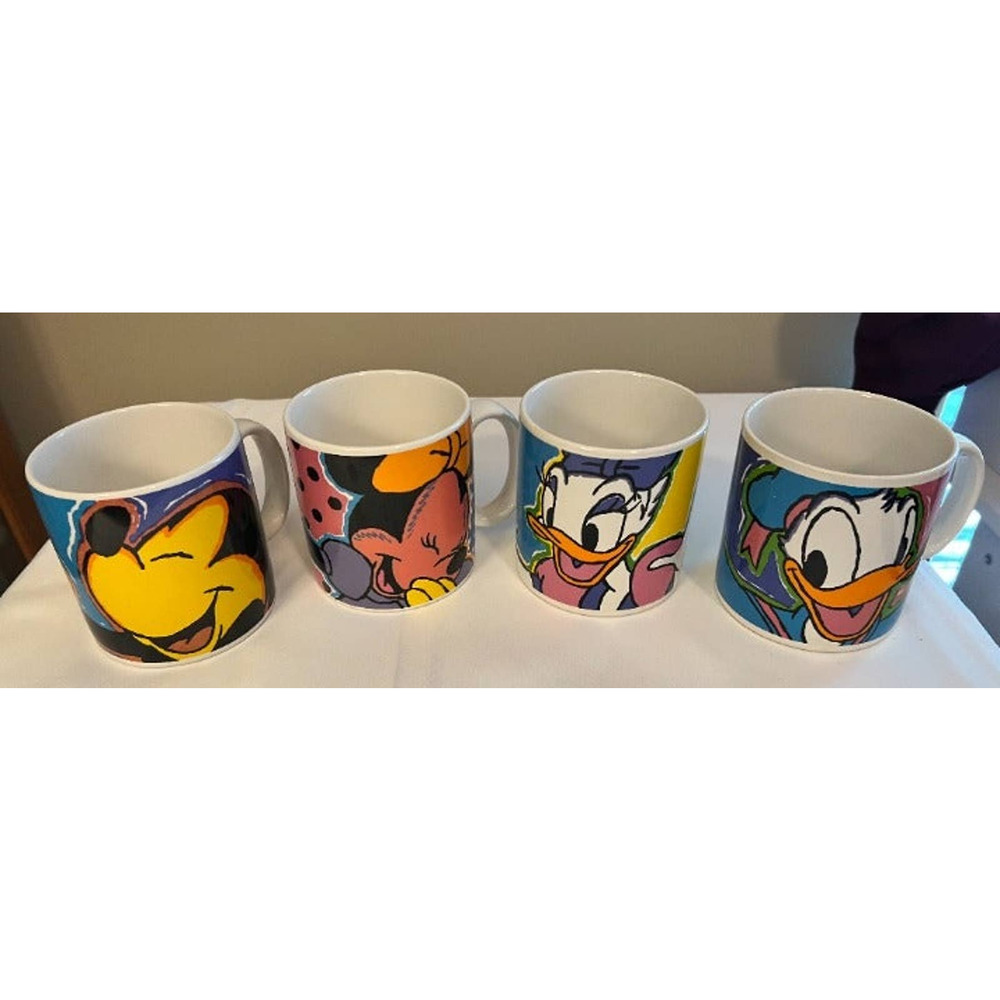 Disney Set of 4 Mugs Mickey, Minnie, Donald and Daisy Set of 4 for $39